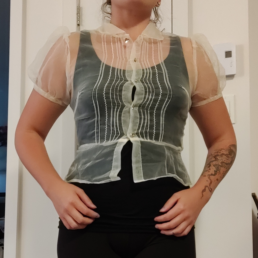 Sheer white top with puffed sleeves